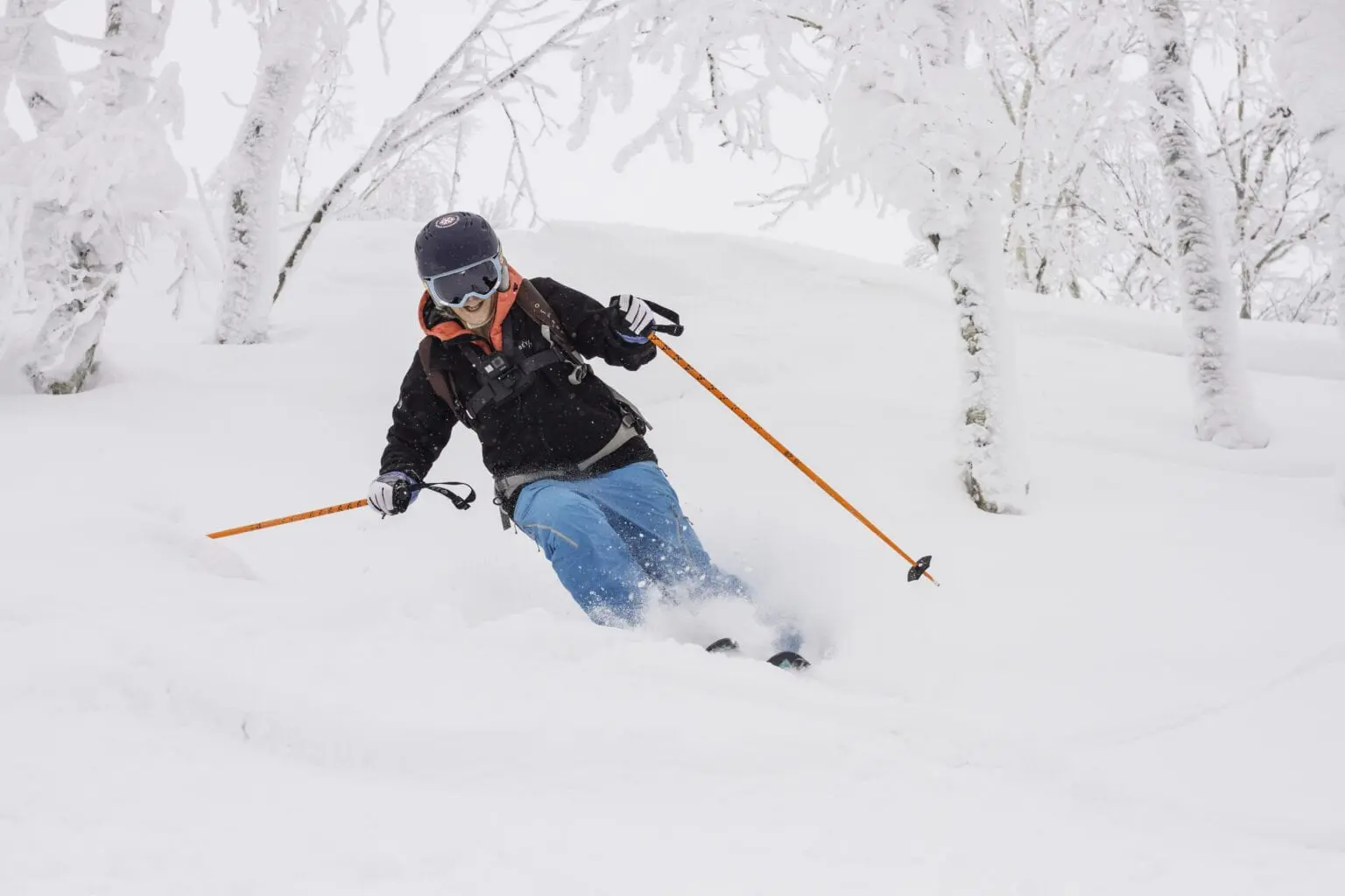 Hilary with big smile backcountry skiing in Rusutsu Japan